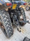 Kubota M8540 Power Crawler usato 4.800 ore di lavoro – vista posteriore con attacco e ruote
