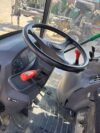 Kubota M8540 Power Crawler usato 4.800 ore di lavoro – posto guida con volante e leve